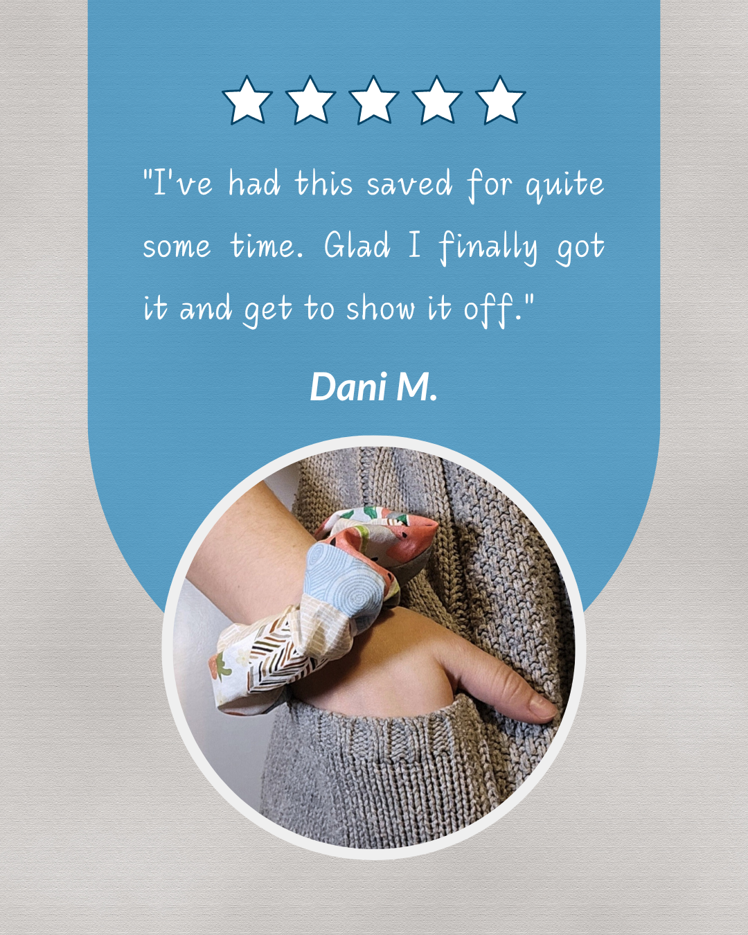 Five-star Wild Raven Co. customer review graphic featuring a photo of several patterned fabric scrunchies worn on a wrist.